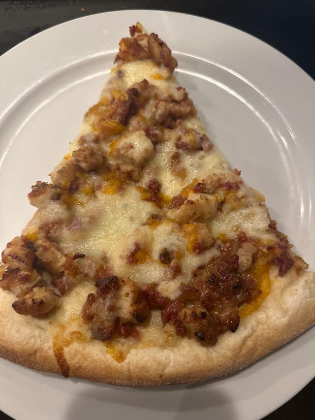 Honey Mustard Bacon Pizza Slice.
