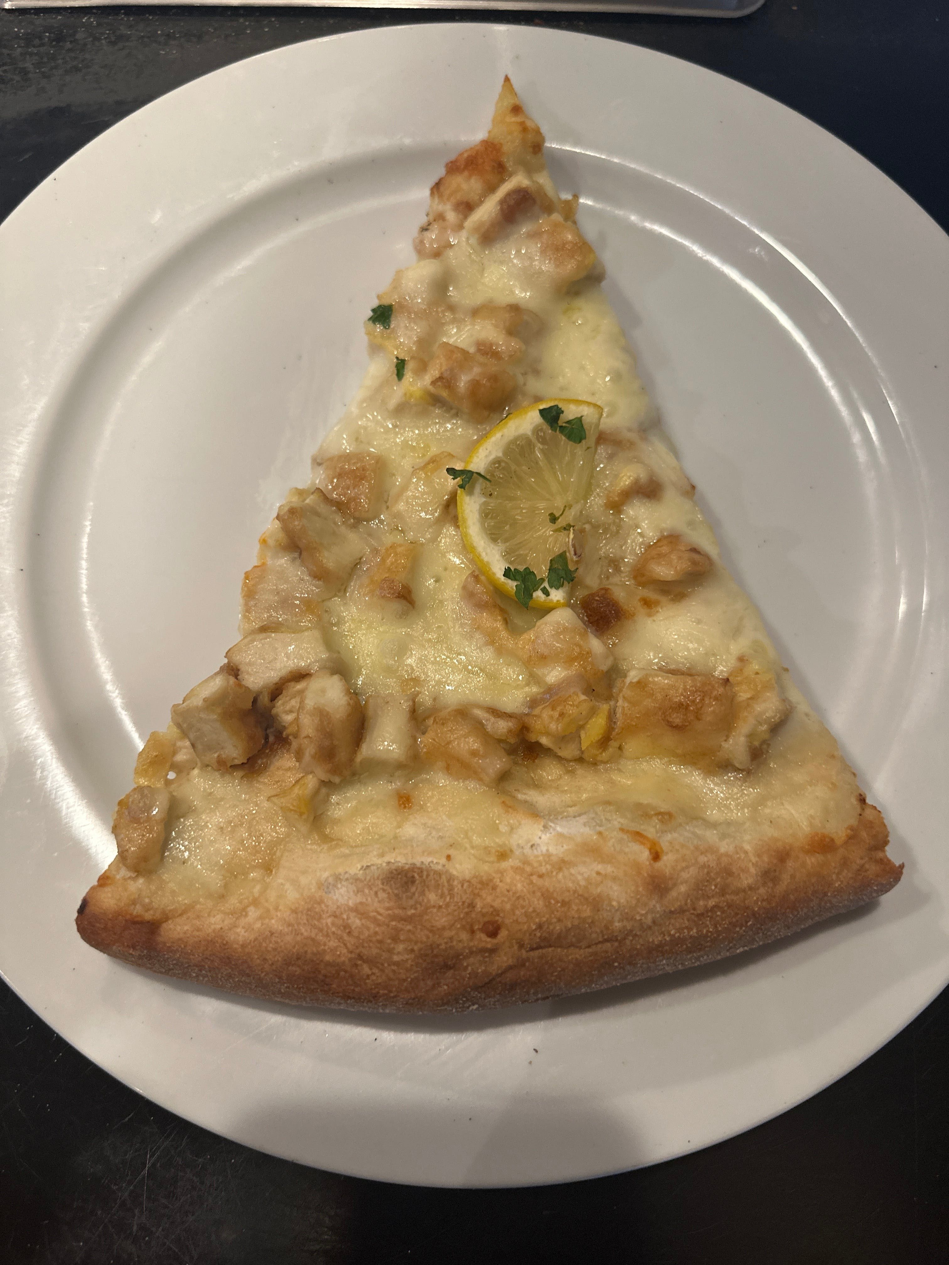 Chicken Francese Pizza Slice.