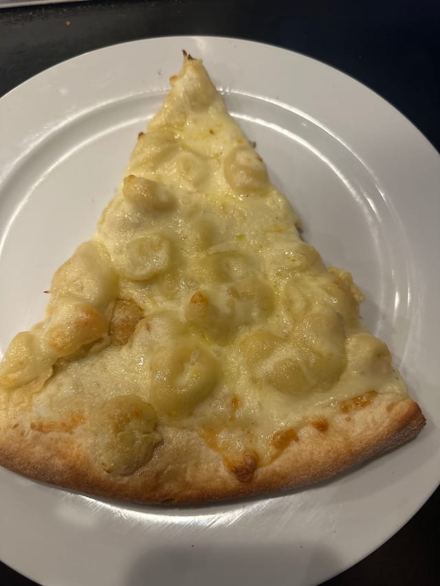 Tortellini Alfredo Pizza Slice.